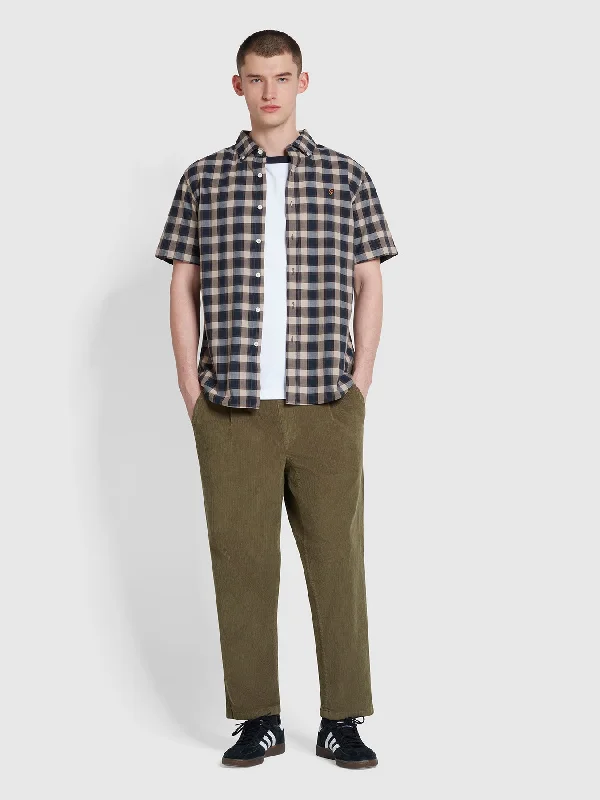 Hawtin Relaxed Tapered Fit Cord Trousers In Olive Green