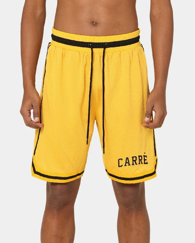 carre-cours-basketball-shorts-yellow