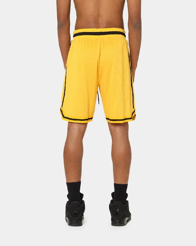 carre-cours-basketball-shorts-yellow