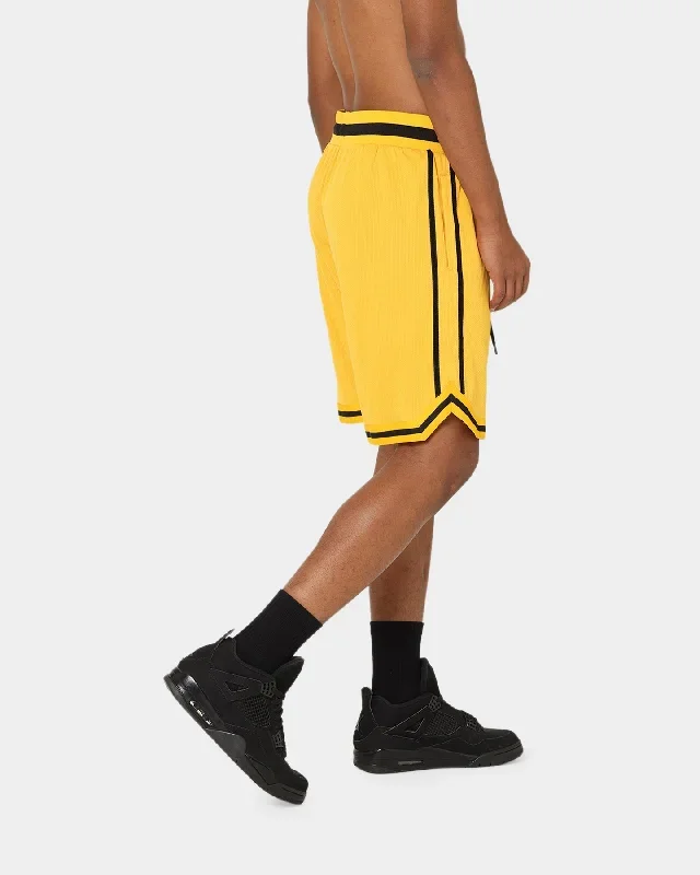 carre-cours-basketball-shorts-yellow