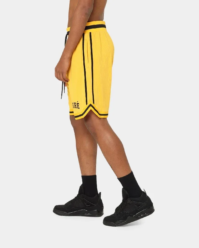 carre-cours-basketball-shorts-yellow