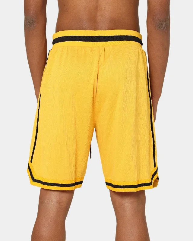 carre-cours-basketball-shorts-yellow