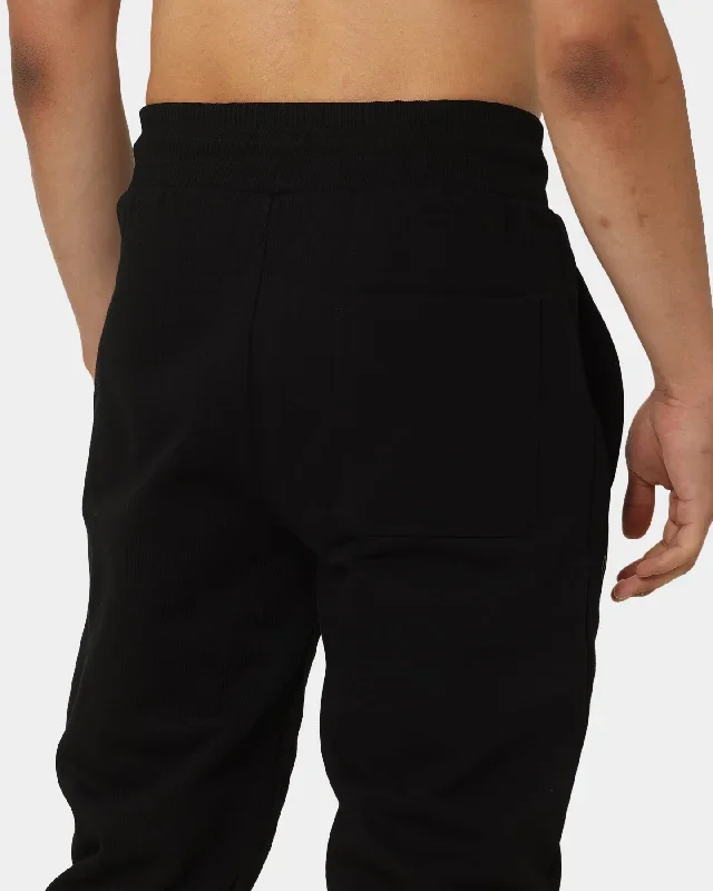 carre-revolutionnaires-classic-track-pants-black